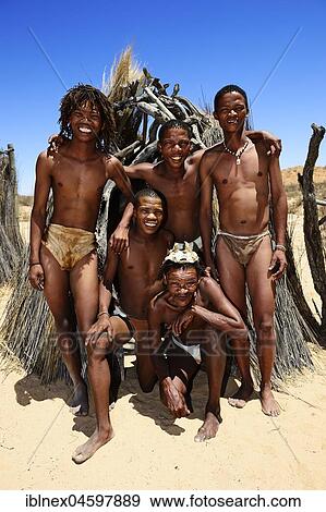 Stock Photo - San Bushmen in traditional village at! Xaus Lodge, Kalahari or Kglagadi Transfrontier Park, Northern Cape, South Africa, Africa. Fotosearch