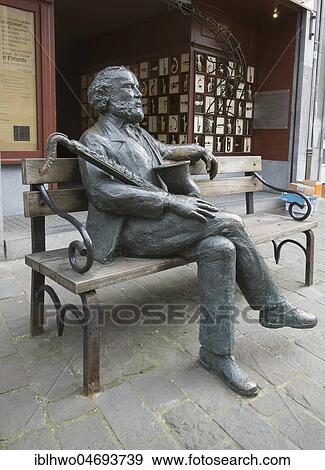 Stock Photo - Sculpture by Adolphe Sax, 1814 -1894, at birthplace, musician and inventor of the saxophone, Dinant, Wallonia, Belgium, Europe. Fotosearch
