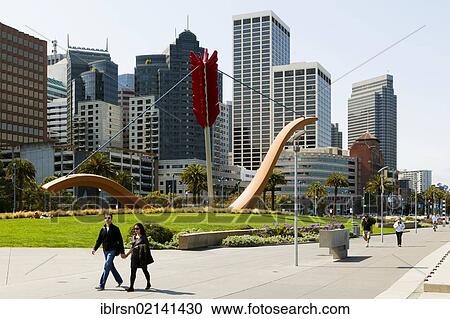 Stock Image - Sculpture, Cupid's Span, by Claes Oldenburg and Coosje van Bruggen, erected in 2003 in Rincon Park on the Embarcadero, San Francisco, California, USA, North America. Fotosearch