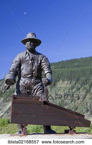 Sculpture of a gold digger in Dawson City, Canada, North America, PublicGround, North America View Large Photo Image Stock Photo - Sculpture of a gold digger in Dawson City, Canada, North America, PublicGround, North America. Fotosearch