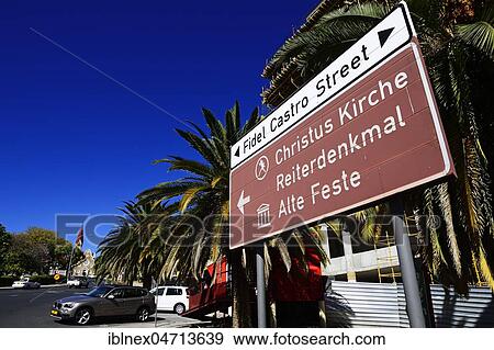 Stock Photo - Sign Christ Church and Fidel Castro street with a view of the church, Windhoek, Namibia, Africa. Fotosearch