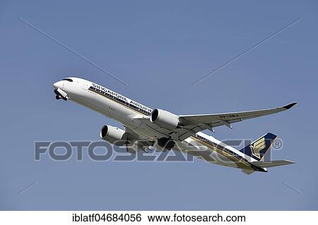Singapore Airlines, Airbus, A350-900, taking off in front of a blue sky, Munich Airport, Upper Bavaria, Bavaria, Germany, Europe View Large Photo Image Stock Photograph - Singapore Airlines, Airbus, A350-900, taking off in front of a blue sky, Munich Airport, Upper Bavaria, Bavaria, Germany, Europe. Fotosearch