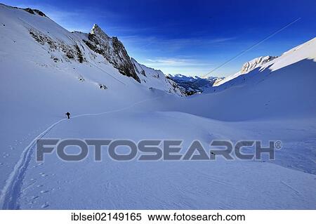 Stock Photography - Ski trail with cross-country skiers, Wildhaus, Toggenburg, St. Gallen, Switzerland, Europe. Fotosearch