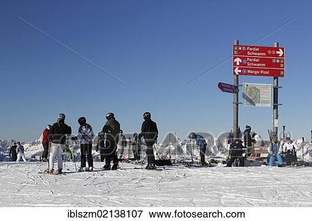 Skiers, guide post in the Pizol ski area, St. Gallen, Switzerland, Europe View Large Photo Image Stock Photo - Skiers, guide post in the Pizol ski area, St. Gallen, Switzerland, Europe. Fotosearch