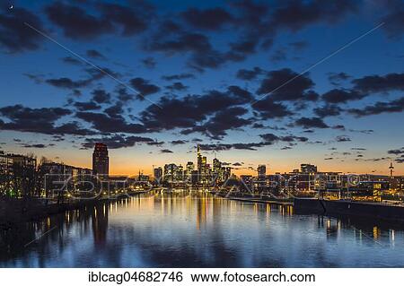 Skyline with cloudy sky at sunset, Frankfurt am Main, Hesse, Germany, Europe View Large Photo Image Stock Photograph - Skyline with cloudy sky at sunset, Frankfurt am Main, Hesse, Germany, Europe. Fotosearch