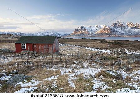 Small red hut, mountains by the sea at back, Lofoten Islands, Norway, Europe View Large Photo Image Stock Photo - Small red hut, mountains by the sea at back, Lofoten Islands, Norway, Europe. Fotosearch