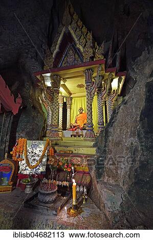 Small temple to honour a monk in the cave temple Wat Tham Suwan Khuha, Phang Nga, Thailand, Asia View Large Photo Image Stock Image - Small temple to honour a monk in the cave temple Wat Tham Suwan Khuha, Phang Nga, Thailand, Asia. Fotosearch
