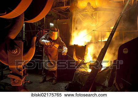 Smelter worker wearing protective equipment, employee of the Luitpoldhuette AG, a foundry that specializes in the casting of engine blocks, motor parts and refrigeration compressors, sampling liquid iron in a furnace, in Amberg, Bavaria, Germany, Europe View Large Photo Image Stock Photography - Smelter worker wearing protective equipment, employee of the Luitpoldhuette AG, a foundry that specializes in the casting of engine blocks, motor parts and refrigeration compressors, sampling liquid iron in a furnace, in Amberg, Bavaria, Germany, Europe. Fotosearch