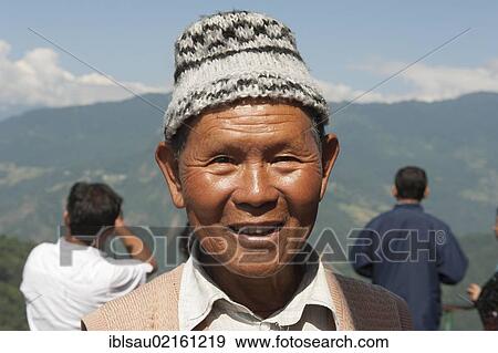 Smiling Sikkimese wearing a cap, portrait, Tashi Viewpoint, mountains near Gangtok, Sikkim, Himalayas, India, South Asia, Asia View Large Photo Image Stock Photo - Smiling Sikkimese wearing a cap, portrait, Tashi Viewpoint, mountains near Gangtok, Sikkim, Himalayas, India, South Asia, Asia. Fotosearch