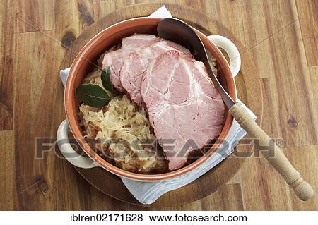 Smoked pork neck roast on sauerkraut, gammon, Kassel-style pork View Large Photo Image Stock Photo - Smoked pork neck roast on sauerkraut, gammon, Kassel-style pork. Fotosearch