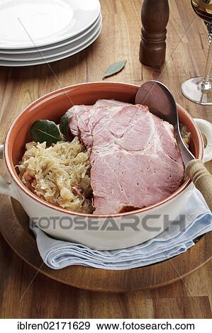 Smoked pork neck roast on sauerkraut, gammon, Kassel-style pork View Large Photo Image Stock Photo - Smoked pork neck roast on sauerkraut, gammon, Kassel-style pork. Fotosearch