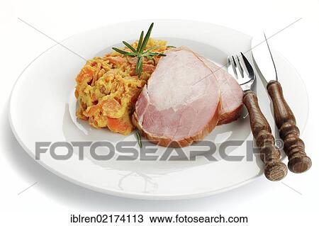 Stock Image - Smoked pork roast, gammon, Kassel-style pork, with carrots. Fotosearch