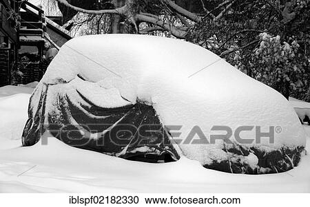 Snow-coverd car with a protective covering View Large Photo Image Stock Image - Snow-coverd car with a protective covering. Fotosearch