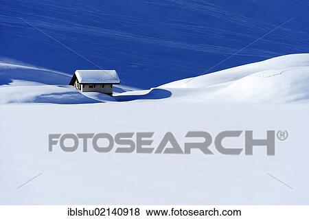 Stock Photo - Snow-covered mountain chalet at Lake Truebsee near Engelberg Mountain, Obwalden, Switzerland, Europe. Fotosearch