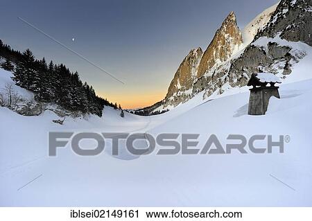 Snow-covered roof of a hut at sunrise, Wildhaus, Toggenburg, St. Gallen, Switzerland, Europe View Large Photo Image Stock Image - Snow-covered roof of a hut at sunrise, Wildhaus, Toggenburg, St. Gallen, Switzerland, Europe. Fotosearch