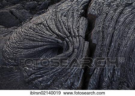 Stock Photo - Solidified ropy pahoehoe type lava in Hawai'i Volcanoes National Park, Hawai'i, USA, North America. Fotosearch