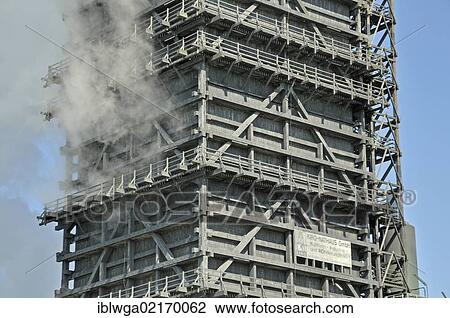 Stock Image - Southern wet quenching tower, Kokerei Schwelgern, coking plant, ThyssenKrupp Steel works in Hamborn, Duisburg, North Rhine-Westphalia, Germany, Europe, PublicGround, Europe. Fotosearch