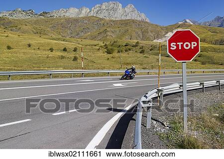 Stock Image - Stop sign on the mountain pass road to El Portalet, border ridge between the regions of Aragon and the French department of Hautes-Pyrénées, Spain, Europe, PublicGround, Europe. Fotosearch