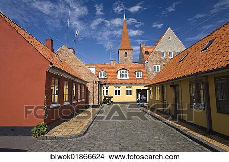 Street, houses and church in Rønne, Bornholm, Denmark, Europe View Large Photo Image Picture - Street, houses and church in Rønne, Bornholm, Denmark, Europe. Fotosearch