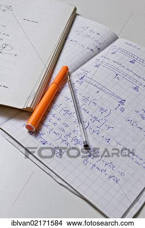 Studying physics, notes View Large Photo Image Picture - Studying physics, notes. Fotosearch