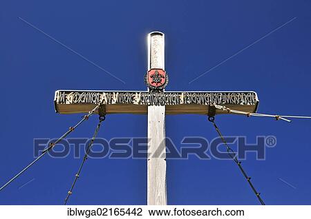 Stock Image - Summit cross against a blue sky, Mt Fellhorn, near Oberstdorf, Upper Allgaeu, Bavaria, Germany, Europe, PublicGround, Europe. Fotosearch