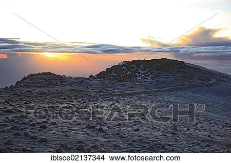 Picture - Sunrise at the crater of Mount Kilimanjaro, Tanzania, Africa. Fotosearch