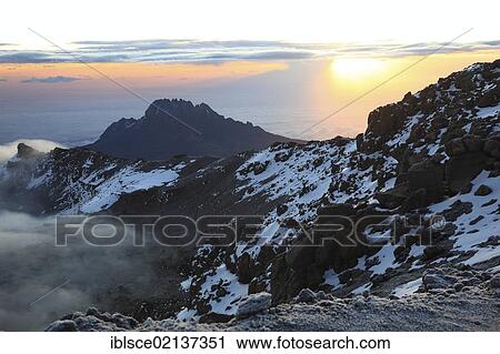 Sunrise at the crater of Mount Kilimanjaro, Tanzania, Africa View Large Photo Image Stock Image - Sunrise at the crater of Mount Kilimanjaro, Tanzania, Africa. Fotosearch