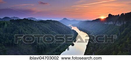 Sunset in the Elbe Valley, on the right the Schrammsteine, behind the Lilienstein, Elbe Sandstone Mountains, National Park Saxon Switzerland, near Schmilka, Saxony, Germany, Europe View Large Photo Image Stock Image - Sunset in the Elbe Valley, on the right the Schrammsteine, behind the Lilienstein, Elbe Sandstone Mountains, National Park Saxon Switzerland, near Schmilka, Saxony, Germany, Europe. Fotosearch
