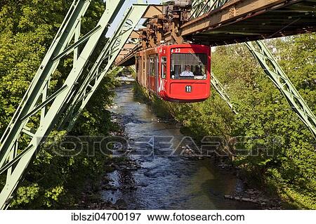 Suspension railway above the river Wupper, Wuppertal, Bergisches Land, North Rhine-Westphalia, Germany, Europe View Large Photo Image Stock Photo - Suspension railway above the river Wupper, Wuppertal, Bergisches Land, North Rhine-Westphalia, Germany, Europe. Fotosearch
