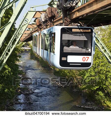Suspension railway, WSW GTW Generation 15, over the river Wupper, Wuppertal, Bergisches Land, North Rhine-Westphalia, Germany, Europe View Large Photo Image Picture - Suspension railway, WSW GTW Generation 15, over the river Wupper, Wuppertal, Bergisches Land, North Rhine-Westphalia, Germany, Europe. Fotosearch