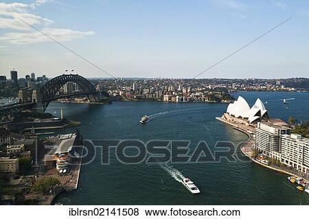 Sydney Cove, with the Opera House and Sydney Harbour Bridge in the harbour, Sydney, New South Wales, Australia, Oceania View Large Photo Image Stock Photo - Sydney Cove, with the Opera House and Sydney Harbour Bridge in the harbour, Sydney, New South Wales, Australia, Oceania. Fotosearch