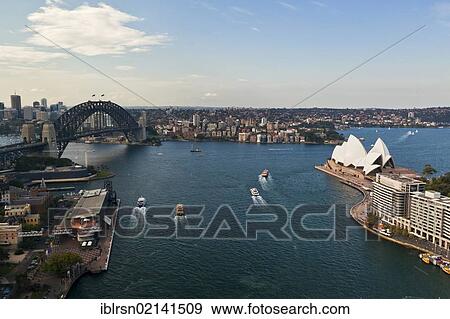 Sydney Cove, with the Opera House and Sydney Harbour Bridge in the harbour, Sydney, New South Wales, Australia, Oceania View Large Photo Image Stock Photo - Sydney Cove, with the Opera House and Sydney Harbour Bridge in the harbour, Sydney, New South Wales, Australia, Oceania. Fotosearch
