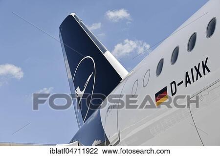 Stock Image - Tail unit, rudder, new Lufthansa Design, new Livery, with identification, D-AIXK, Lufthansa, Airbus, A 350-900, Germany, Europe. Fotosearch