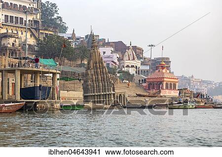 Stock Image - Temples and palaces on the ghats at Ganges river, Varanasi, Uttar Pradesh, India, Asia. Fotosearch
