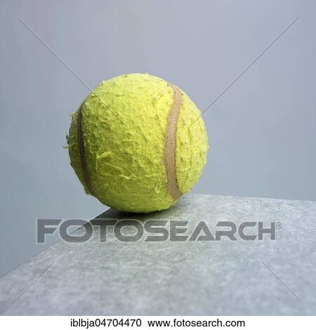 Tennis ball on a table, studio shot, still View Large Photo Image Stock Image - Tennis ball on a table, studio shot, still. Fotosearch