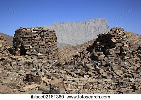 The Beehive Tombs of Al-Ayn on the edge of Jebel Misht mountain ridge, in the area between the towns of Bat and Al-Ayn in the Hajar Mountains, UNESCO World Heritage Site, Oman, Arabian Peninsula, Middle East, Asia View Large Photo Image Stock Image - The Beehive Tombs of Al-Ayn on the edge of Jebel Misht mountain ridge, in the area between the towns of Bat and Al-Ayn in the Hajar Mountains, UNESCO World Heritage Site, Oman, Arabian Peninsula, Middle East, Asia. Fotosearch