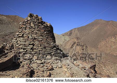 The Beehive Tombs of Al-Ayn on the edge of Jebel Misht mountain ridge, in the area between the towns of Bat and Al-Ayn in the Hajar Mountains, UNESCO World Heritage Site, Oman, Arabian Peninsula, Middle East, Asia View Large Photo Image Stock Photograph - The Beehive Tombs of Al-Ayn on the edge of Jebel Misht mountain ridge, in the area between the towns of Bat and Al-Ayn in the Hajar Mountains, UNESCO World Heritage Site, Oman, Arabian Peninsula, Middle East, Asia. Fotosearch