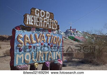 The entrance to Salvation Mountain, a desert hillside covered with religious messages, created by Leonard Knight, Niland, California, USA, North America View Large Photo Image Picture - The entrance to Salvation Mountain, a desert hillside covered with religious messages, created by Leonard Knight, Niland, California, USA, North America. Fotosearch