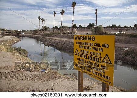 The heavily-polluted New River, as it enters the USA from Mexico; the pollution results from a mix of untreated sewage, agricultural runoff, and industrial waste, Calexico, California, USA, North America View Large Photo Image Stock Image - The heavily-polluted New River, as it enters the USA from Mexico; the pollution results from a mix of untreated sewage, agricultural runoff, and industrial waste, Calexico, California, USA, North America. Fotosearch