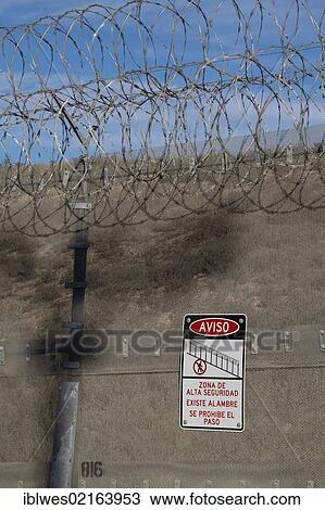 Stock Image - The international border between the United States and Mexico, the northernmost and newest of two border fences in this region, San Ysidro, California, USA, North America. Fotosearch