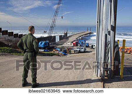 The U. S. Border Patrol's "Surf Fence Project" extends the border fence between the United States and Mexico further into the Pacific Ocean, San Ysidro, California, USA, North America View Large Photo Image Stock Photography - The U. S. Border Patrol's "Surf Fence Project" extends the border fence between the United States and Mexico further into the Pacific Ocean, San Ysidro, California, USA, North America. Fotosearch