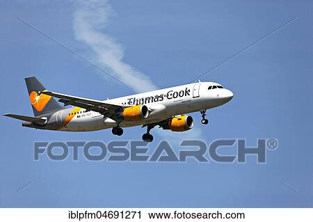 Thomas Cook Airbus A320 passenger aircraft, on landing approach to Franz Josef Strauss Airport, Munich, Upper Bavaria, Germany, Europe View Large Photo Image Stock Image - Thomas Cook Airbus A320 passenger aircraft, on landing approach to Franz Josef Strauss Airport, Munich, Upper Bavaria, Germany, Europe. Fotosearch