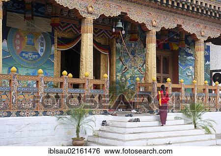 Tibetan Buddhism, believers, ornate entrance to the meeting hall, fortress-monastery, Dzong, Punakha, the Himalayas, Kingdom of Bhutan, South Asia, Asia View Large Photo Image Stock Photograph - Tibetan Buddhism, believers, ornate entrance to the meeting hall, fortress-monastery, Dzong, Punakha, the Himalayas, Kingdom of Bhutan, South Asia, Asia. Fotosearch