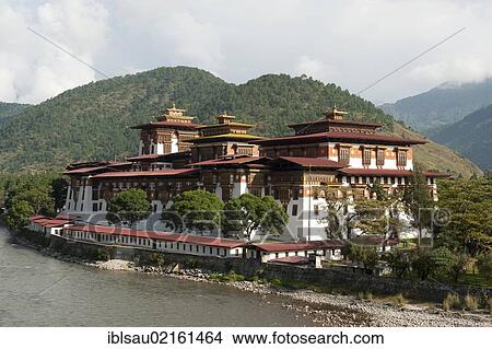Tibetan Buddhism, fortess-monastery by the river, Dzong, Punakha, the Himalayas, Kingdom of Bhutan, South Asia, Asia View Large Photo Image Picture - Tibetan Buddhism, fortess-monastery by the river, Dzong, Punakha, the Himalayas, Kingdom of Bhutan, South Asia, Asia. Fotosearch