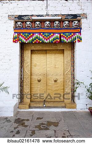 Stock Photo - Tibetan Buddhism, gold-studded door, gate, entrance, fortress-monastery, Dzong, Punakha, the Himalayas, Kingdom of Bhutan, South Asia, Asia. Fotosearch