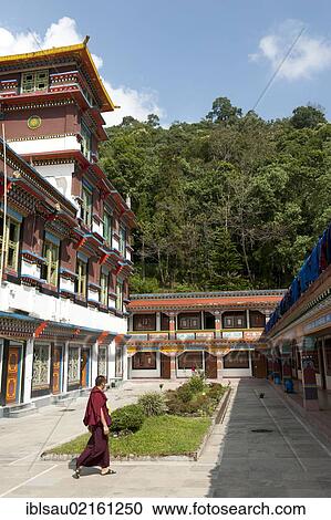 Tibetan Buddhism, Karma-Kagyu Lineage, monk walking in the courtyard, Lingdum Gompa Monastery near Gangtok, Sikkim, Himalayas, India, South Asia, Asia View Large Photo Image Stock Image - Tibetan Buddhism, Karma-Kagyu Lineage, monk walking in the courtyard, Lingdum Gompa Monastery near Gangtok, Sikkim, Himalayas, India, South Asia, Asia. Fotosearch