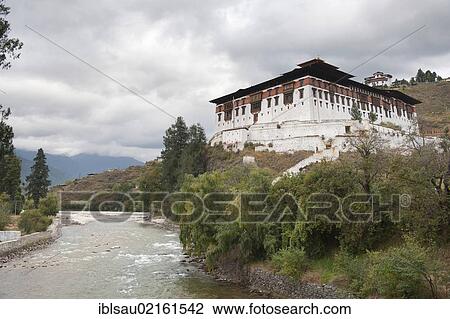 Tibetan Buddhism, Rinpung Dzong Monastery and Fortress beside a river, Paro, Himalayas, Bhutan, South Asia, Asia View Large Photo Image Stock Image - Tibetan Buddhism, Rinpung Dzong Monastery and Fortress beside a river, Paro, Himalayas, Bhutan, South Asia, Asia. Fotosearch