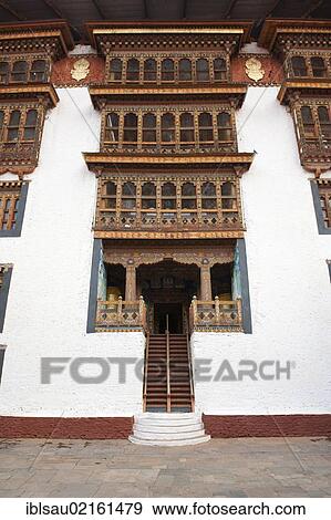 Stock Photo - Tibetan Buddhism, steep staircase, ornate wooden windows, fortress-monastery, Dzong, Punakha, the Himalayas, Kingdom of Bhutan, South Asia, Asia. Fotosearch