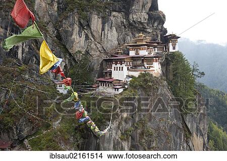Tibetan Buddhism, Taktsang Palphug Monastery on a rock face, also known as The Tiger's Nest, near Paro, Himalayas, Bhutan, South Asia, Asia View Large Photo Image Picture - Tibetan Buddhism, Taktsang Palphug Monastery on a rock face, also known as The Tiger's Nest, near Paro, Himalayas, Bhutan, South Asia, Asia. Fotosearch