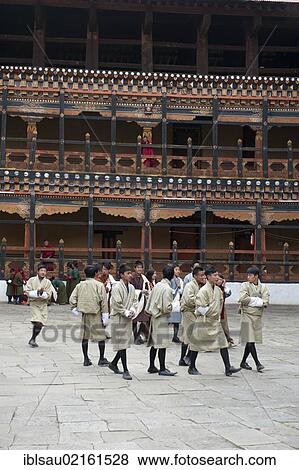 Tibetan Buddhist festival, men wearing the traditional Gho robe, Rinpung Dzong Monastery and Fortress, courtyard, Paro, Himalayas, Bhutan, South Asia, Asia View Large Photo Image Stock Photo - Tibetan Buddhist festival, men wearing the traditional Gho robe, Rinpung Dzong Monastery and Fortress, courtyard, Paro, Himalayas, Bhutan, South Asia, Asia. Fotosearch